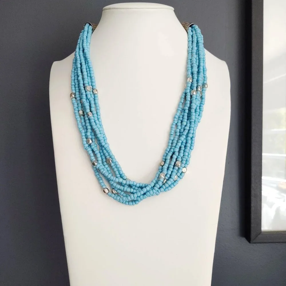 8 strand blue and silver beaded necklace